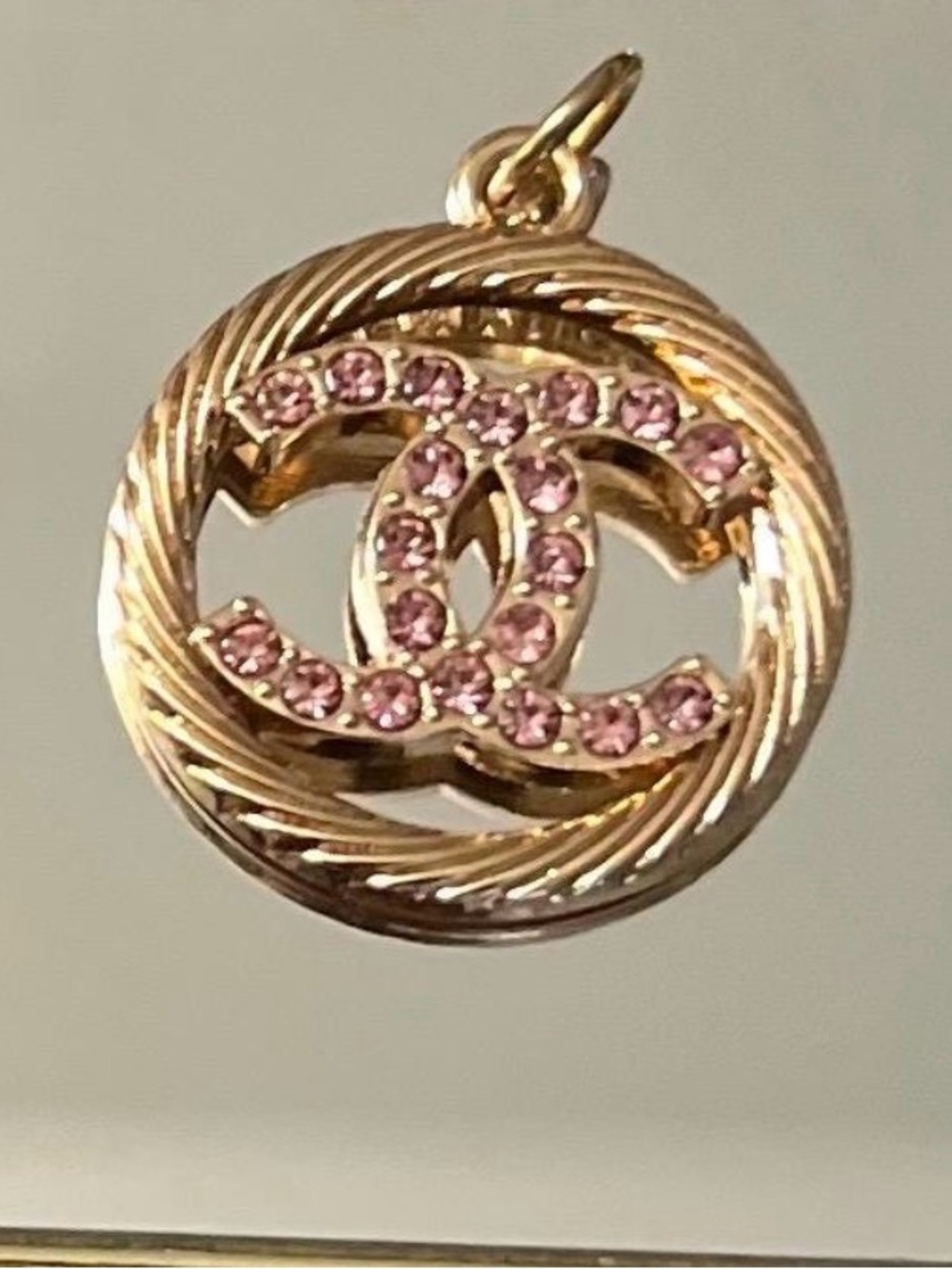 CHANEL Gold-Tone Pendant Necklace with Pink Crystal CC Emblem